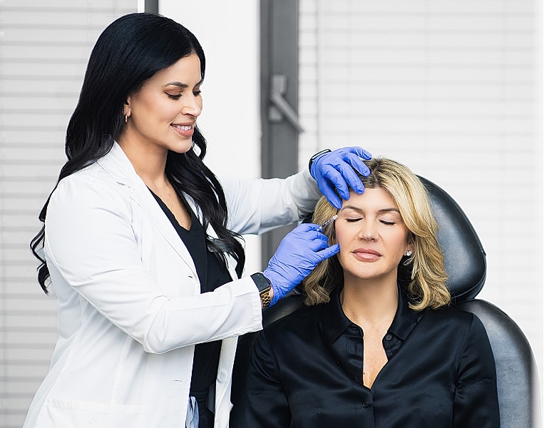 Cosmetic treatment session in a professional clinic.